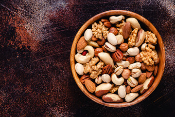 Various Nuts in wooden bowl