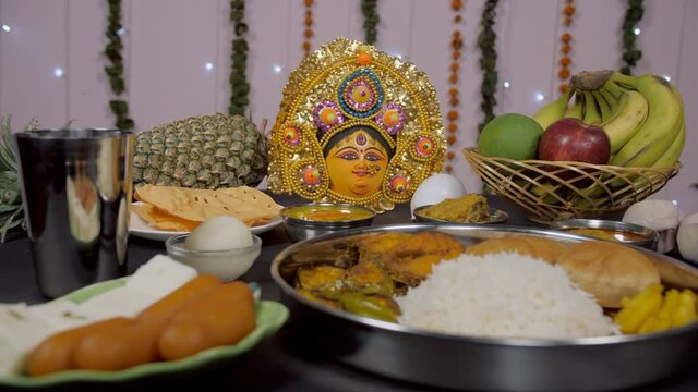 Regional Thali from West Bengal with sweets served as Bhog/Prasad to Ma Durga. Bengali tradition of offering rice  Dal  fish  fries  papad  sweets  fruits  and water on Durga Puja to a Hindu Goddess
