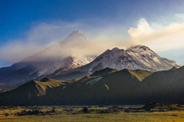 Fototapeta premium Volcanoes Kamen and Bezymyanny, Klyuchevskoy National Park, Kamchatka Peninsula, Russia