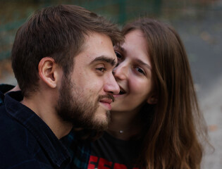 Fototapeta premium Couple kissing. Portrait of couple. Couple in love. Man and woman at the street. Couple are hugging.