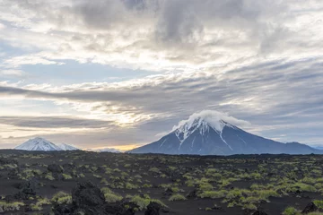 Foto op Canvas At sunrise, the cone of the Big Udina volcano © WladiM