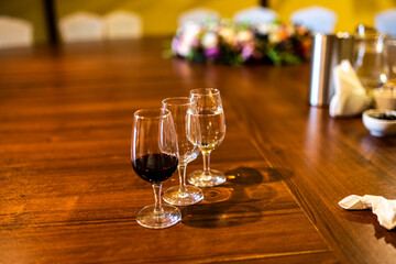 still life with tasting wine glasses on a table at a winery