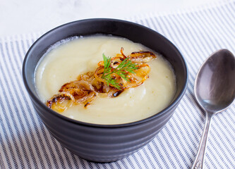 Cream of Jerusalem artichoke soup. Vegetarian dish of Jerusalem artichoke tubers.