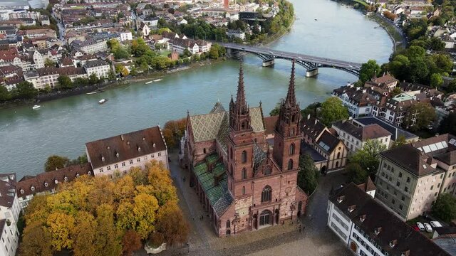 Aerial view over the city of Basel Switzerland and Cathedral - drone footage