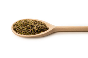 Oregano spice in wooden spoon isolated.