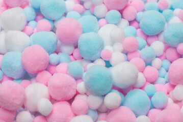 White, pink and blue soft pompons.