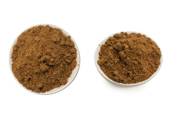 Mix spices in a bowl isolated on white.