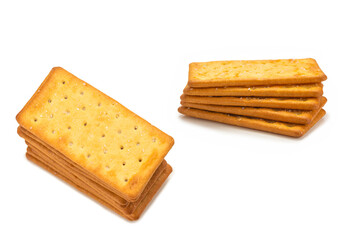 Cracker with salt isolated on white.