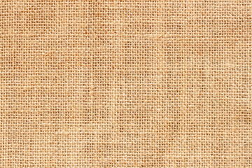 Natural organic sackcloth background, texture closeup of burlap, canvas, pattern for backdrop