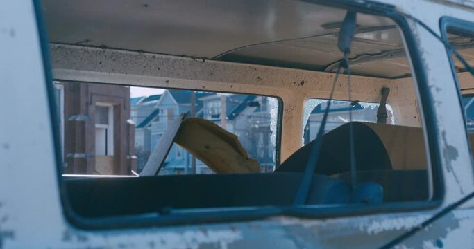 Broken windows on van destroyed by tornado
