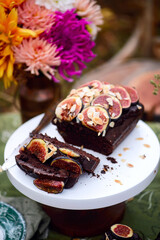Chocolate fig loaf cake in the autumn forest.style vintage