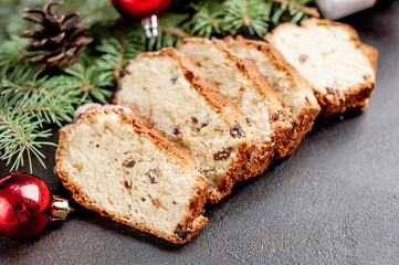 Christmas cupcake on a background of a stone with a Christmas tree, Christmas decorations, gifts	