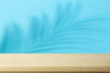  Flat lay  background. Minimal blurred background with shadows of palms and empty wooden table.