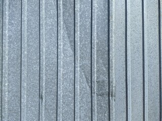 texture and background of old and silver metal sheet fence