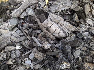 cooled and black coals from a fire