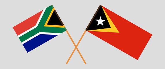 Crossed flags of East Timor and Republic of South Africa