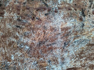 Colored rusty stained metal wall texture pattern