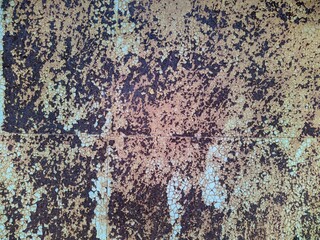 Colored rusty stained metal wall texture pattern