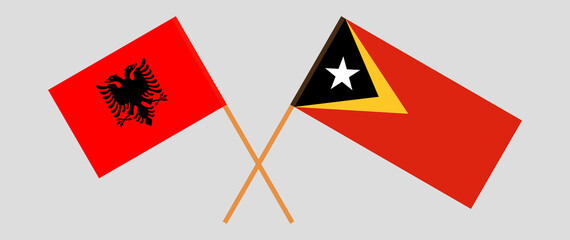 Crossed flags of East Timor and Albania