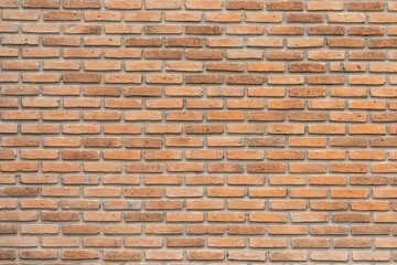 brick walls background and texture. The texture of the brick is orange. Background of empty brick basement wall.