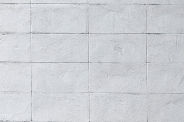 White brick walls that are plastered background and texture. The texture of the block is white. Background of empty block basement wall.