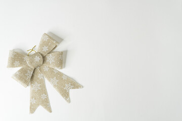 Christmas ribbon in gold color and white background