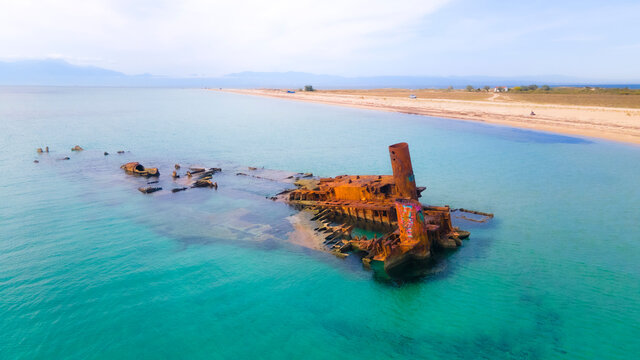 Drone pics over a shipwreck next to a tropical beach in Epanomi, Macedonia, Greece
