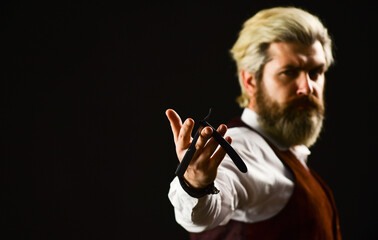 Vintage barbershop. Barber tools. Trimming or shaving. Barbershop services. Keep yourself looking groomed all year round. Hipster Barber. Man with beard and moustache. Mature man dyed hair