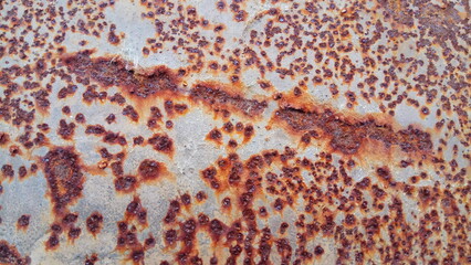 texture of rust and burnt paint on metal