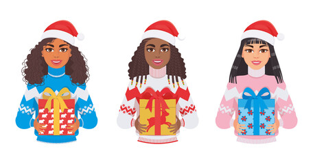 Girls of Asian, African, Latin American appearance with Christmas gifts in their hands in Santa hats in winter sweaters are smiling. Set of characters isolated on a white background.