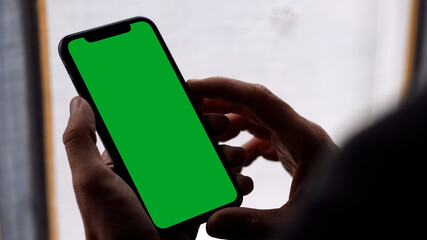 Single Tapping and Holding a Green Screen iPhone