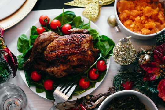 Overhead View Of Holiday Christmas Dinner Table Setting