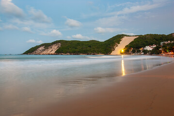 Ponta Negra beach, with Morro do Careca in the background, in the late afternoon, Natal, Rio Grande...