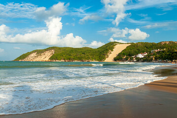 Ponta Negra beach, with Morro do Careca in the background, in the late afternoon, Natal, Rio Grande do Norte, Brazil on February 19, 2008.