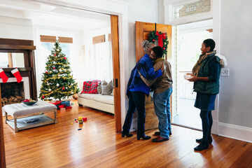 Black family visiting grandmother for Christmas holidays