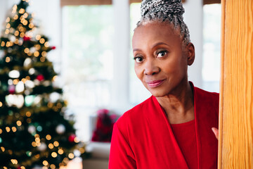 Portrait of Senior Black woman looking at camera on Christmas and smiling