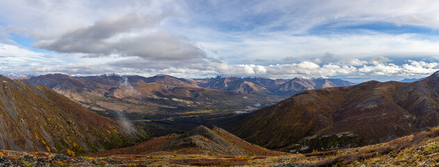 Beautiful Panoramic View of Scenic Mountains and Landscape in Canadian Nature. Taken in Tombstone Territorial Park, Yukon, Canada.