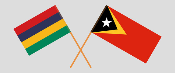 Crossed flags of East Timor and Mauritius