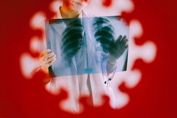 Doctors' fight against coronavirus. Doctors on the front line. A radiologist in a medical mask and...