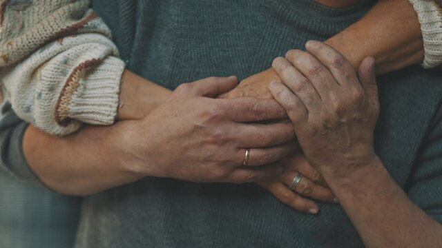 Close Up Wrinkled Hands. Happy Old Couple Hugging In Park. Senior Man Flirting With Elderly Woman. Romance At Old Age Dancing On Autumn Day. High Quality 4k Footage