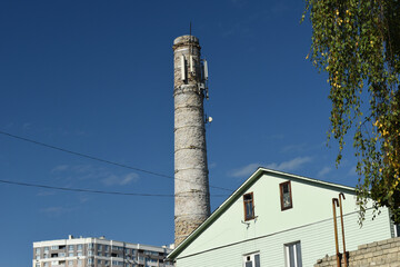 The high round pipe of the boiler room is made of bricks.