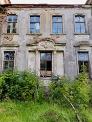 ZHELUDOK, BELARUS - SEPTEMBER 12, 2020: The abandoned manor of Svyatopolk-Chetvertinsky, built in the early 20th century. Popular tourist attraction in Belarus - 385609645