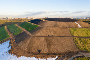 Aerial view of  recultivation of former garbage and waste hill