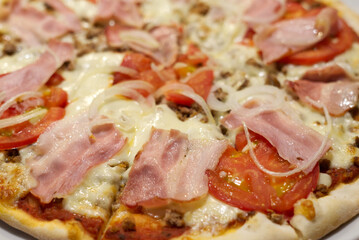 A close up of a slice of pizza