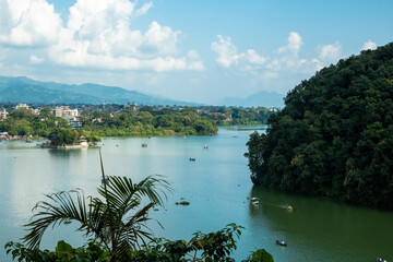 Aerial view of the Lakeside area in Pokhara city, Nepal, with the surrounding hills and Phewa Lake