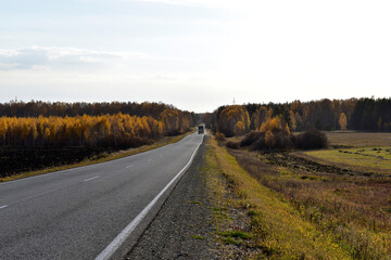 High-speed asphalt highway in the countryside in the forest