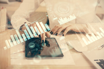 Double exposure of forex chart sketch hologram and woman holding and using a mobile device. Financial market concept.