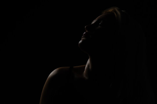 silhouette of women on black background