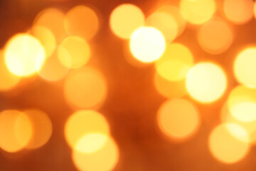 Defocused abstract bokeh golden lights texture. Festive, New Year Christmas background