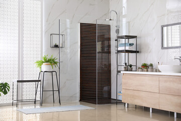 Bathroom interior with shower stall, counter and houseplants. Idea for design